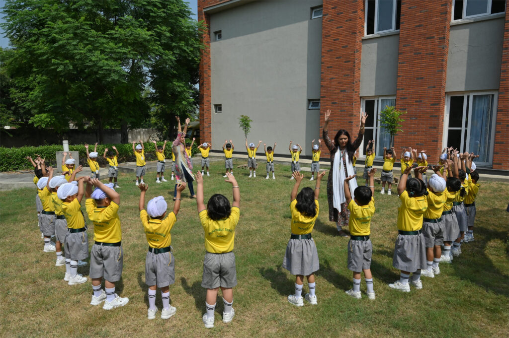 Children Raising Hands DPS Patiala